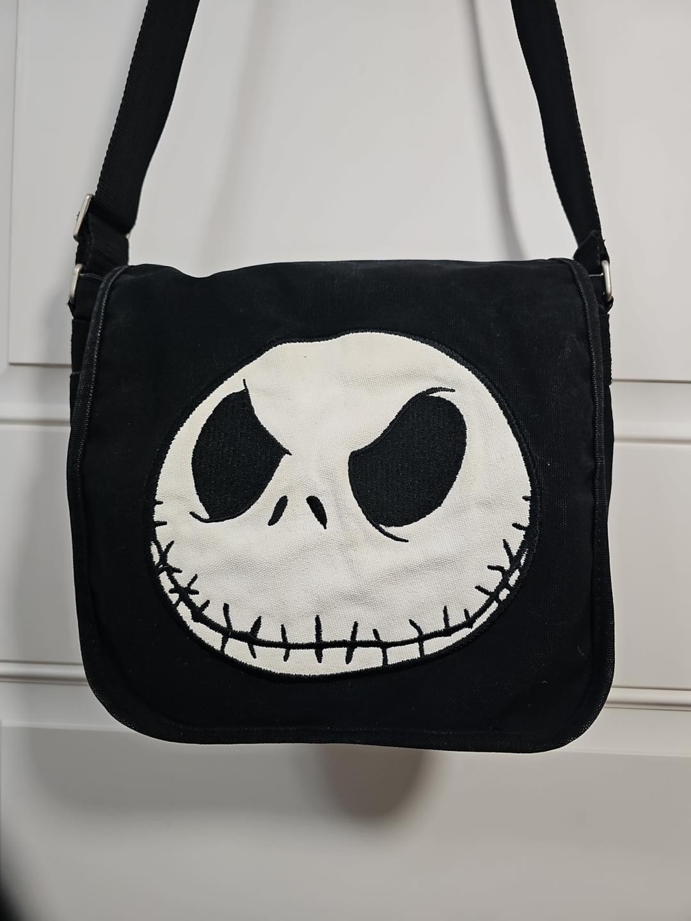 Black Canvas Messenger Bag with White Skull Face